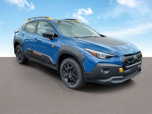 2026 Subaru CROSSTREK Wilderness in Geyser Blue — front three-quarter view