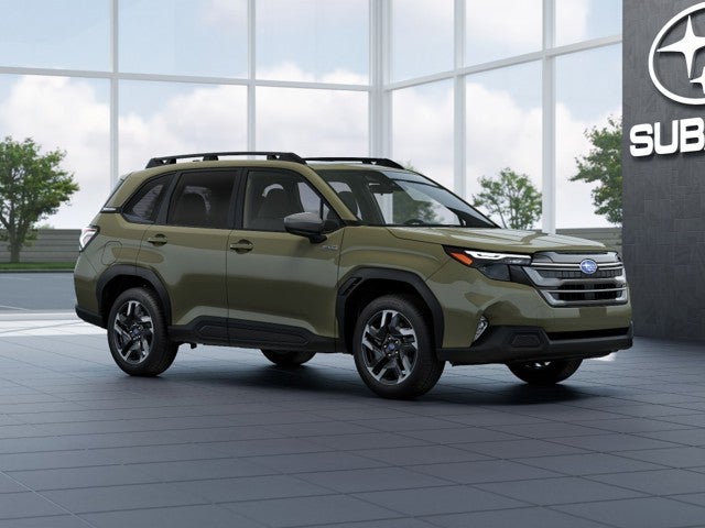 2026 Subaru FORESTER Premium Hybrid in Autumn Green Metallic — front three-quarter view